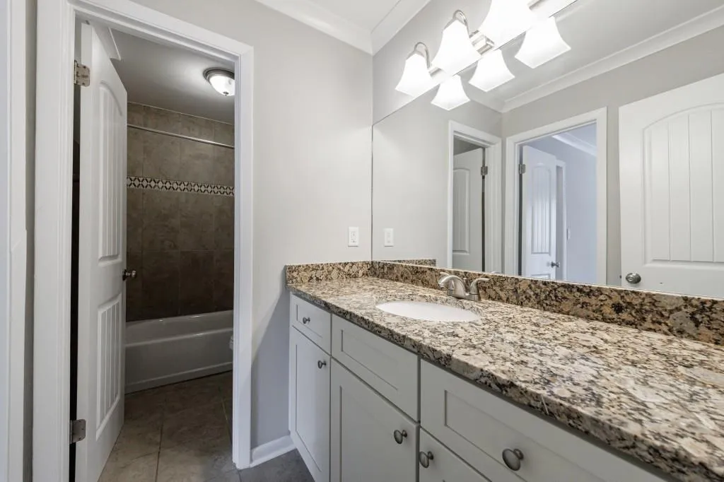 Secondary bath with granite counter tops