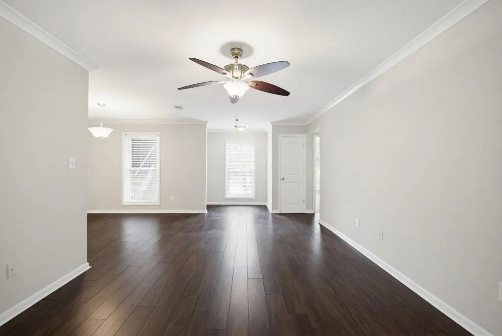 Living room open to dining room and sunroom