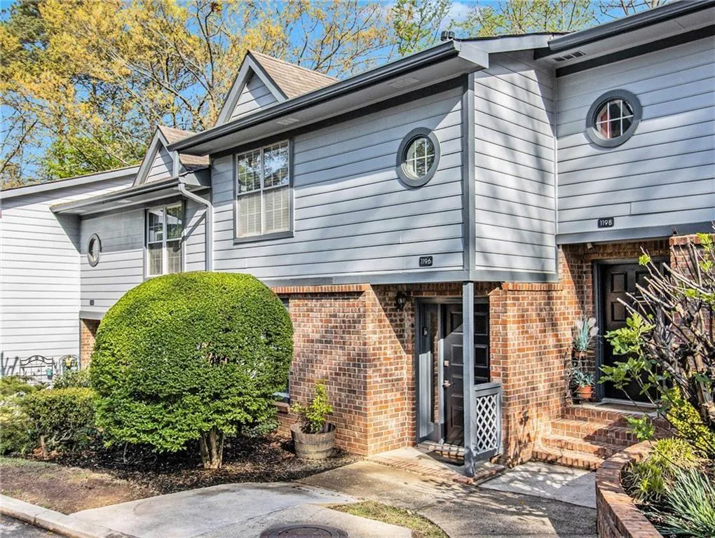 Brick and siding exterior with gabled roof lines