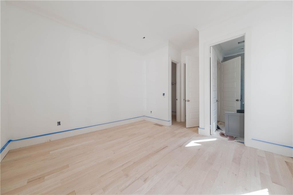 Spare room with light hardwood / wood-style floors