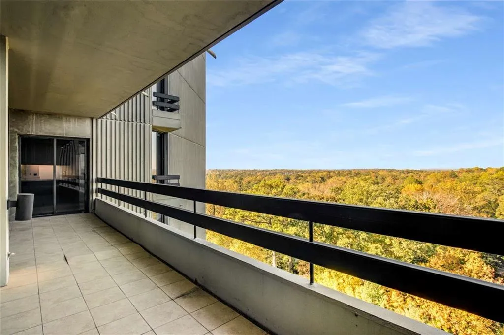 Balcony with a wooded view