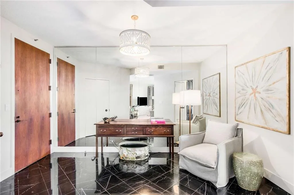 Office featuring baseboards and suspended lighting