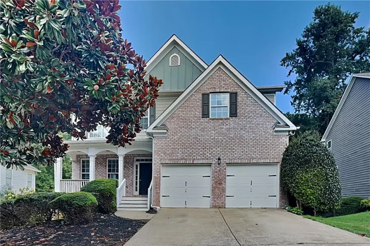 Brick and siding exterior with gabled roof lines