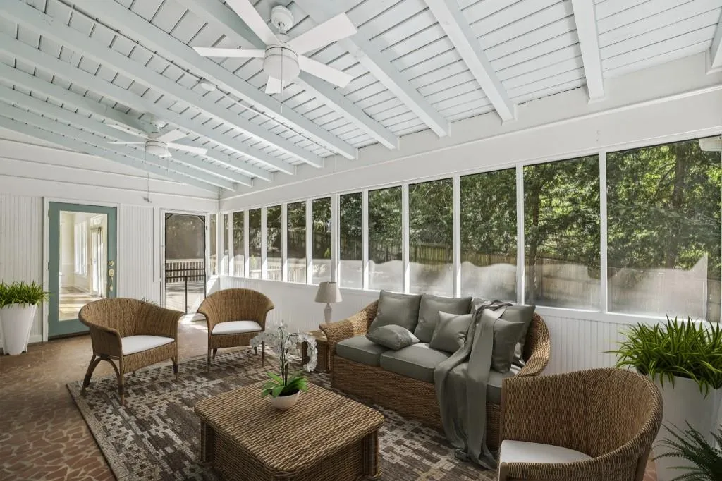 Expansive Screened Porch Overlooking The Fully Fenced Backyard