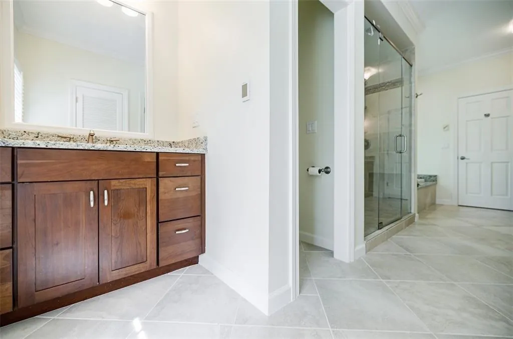 Separate Vanities with Two Walk-In Closets