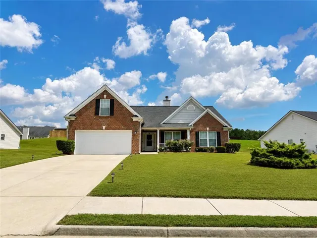 Brick and siding exterior with a gabled roof