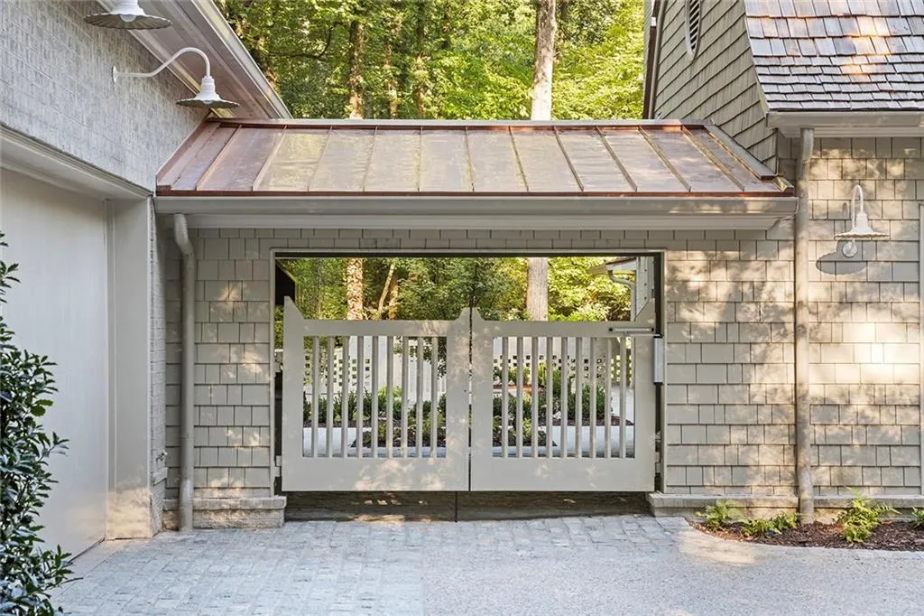 Porte cochere can be used as additional parking or outdoor entertaining space
