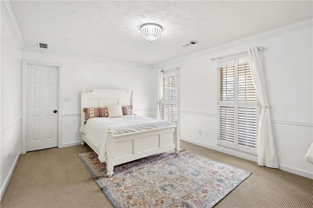 Upstairs guest bedroom #2 features a walk-in closet