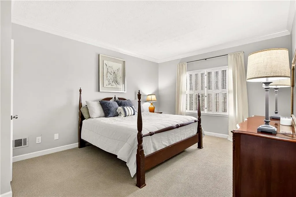 Main level guest bedroom is perfect for guests who may not want, or be able, to deal with stairs!