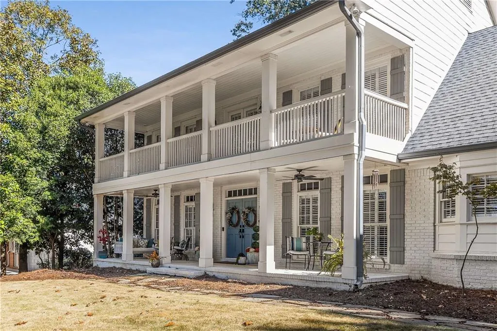 The painted exterior and shutters give new life to this all-brick home!