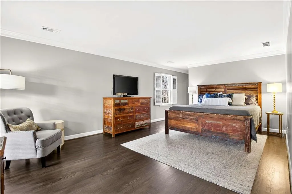 Large primary bedroom with plenty of room for all of your oversized bedroom furniture.