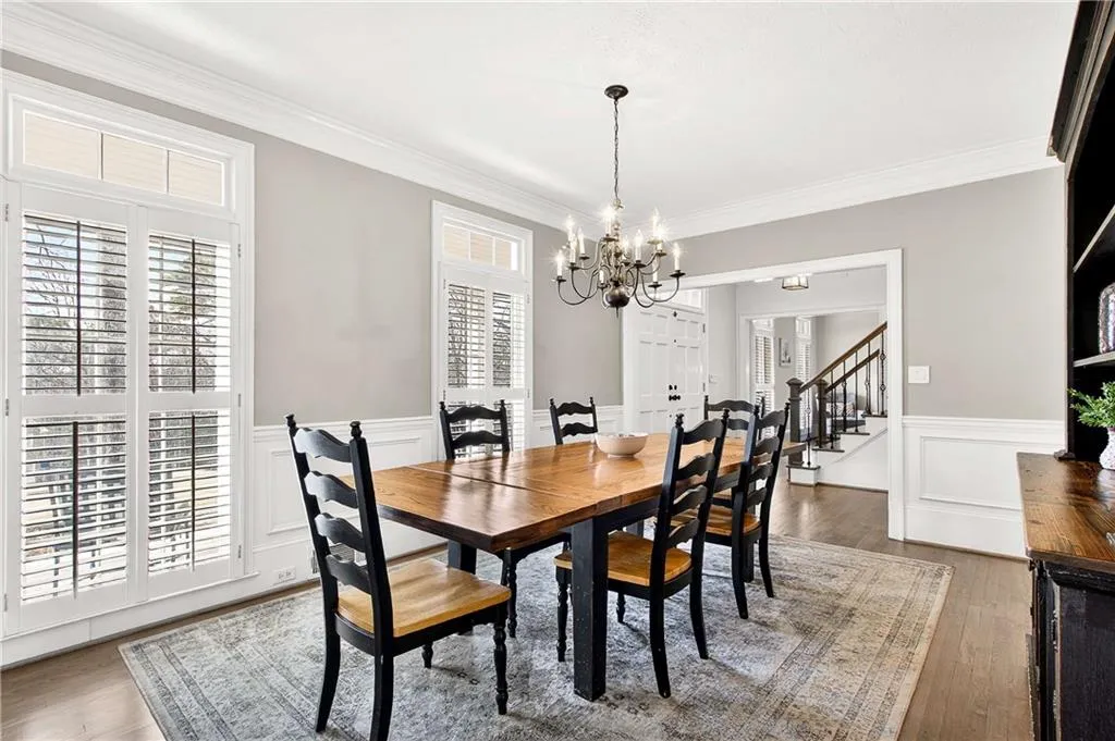 Large formal dining room with tons of natural light and plenty of seating for your largest dinner parties!