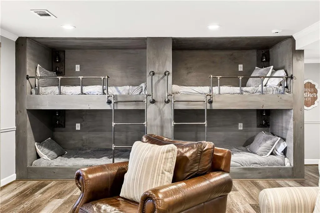 The coolest custom built-in bunk beds - perfect for sleepovers with friends! Each has their own light and their own charging stations