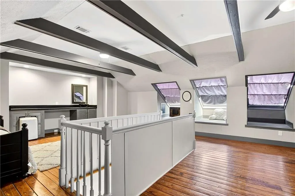 This space could easily be an additional bedroom suite (as it's currently being used), a kid hang-out spot, a craft or art room (easy clean-up with a sink) or even a man cave! Use your imagination!