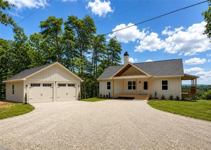 AI enhanced photo to illustrate the possible garage addition.