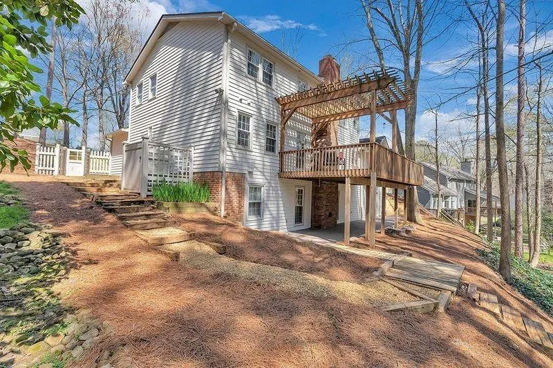 walk down  steps to get to flat area of back yard