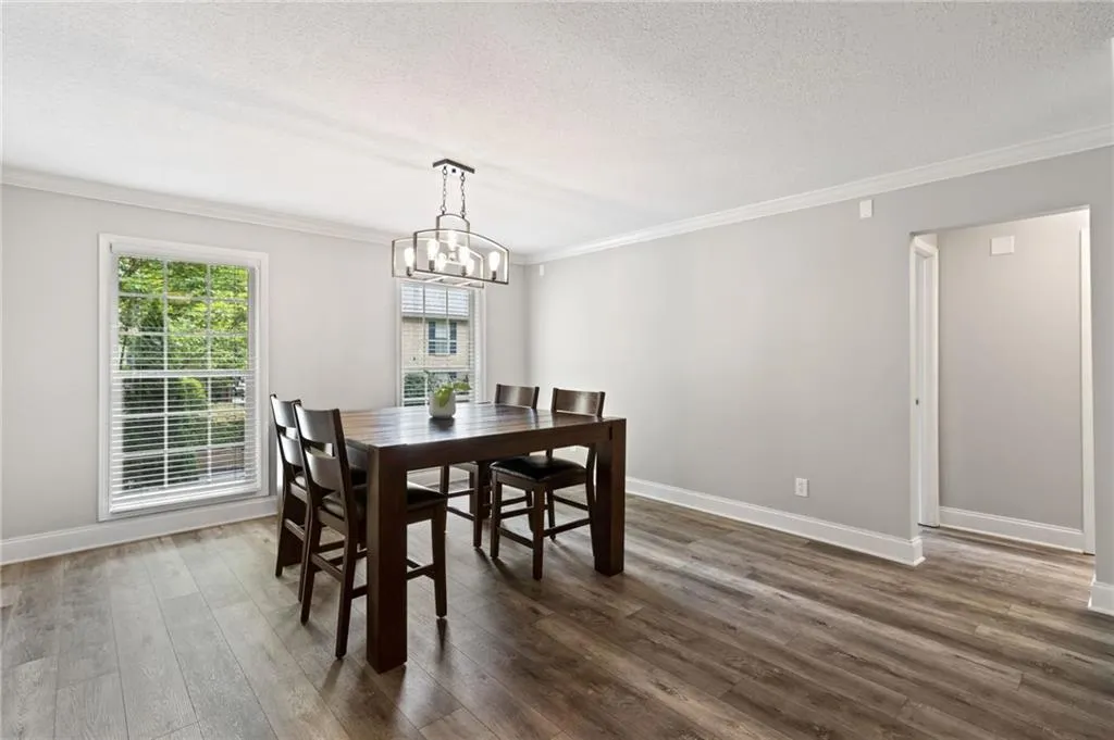 Dining area is on the front side of the building.  Doorway ahead leads to hallway where bedrooms are located.