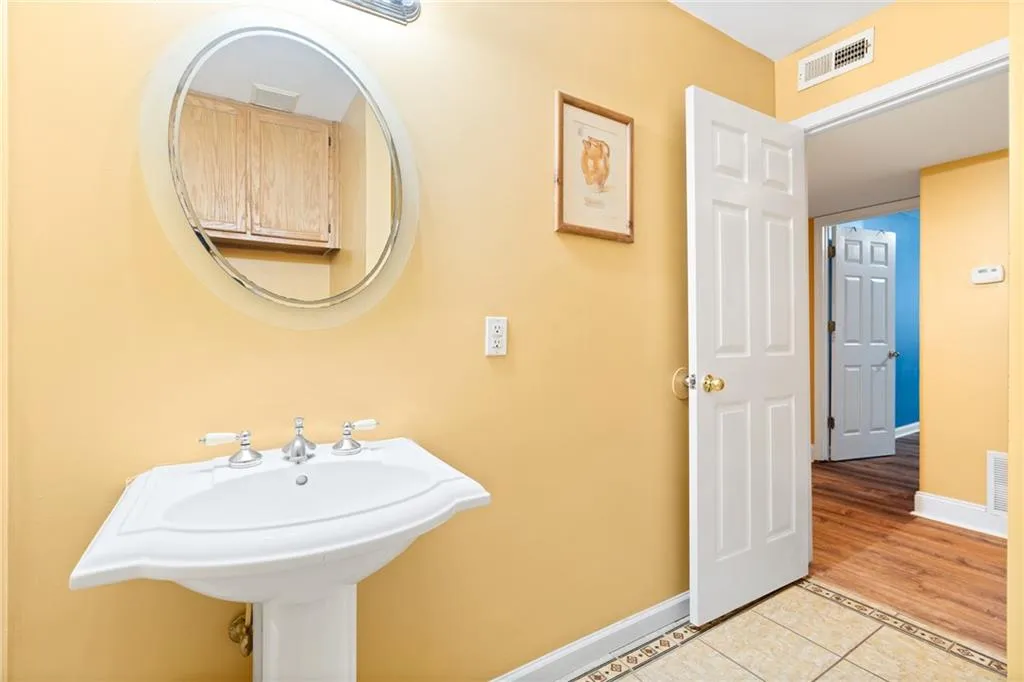 Bathroom featuring hardwood / wood-style floors