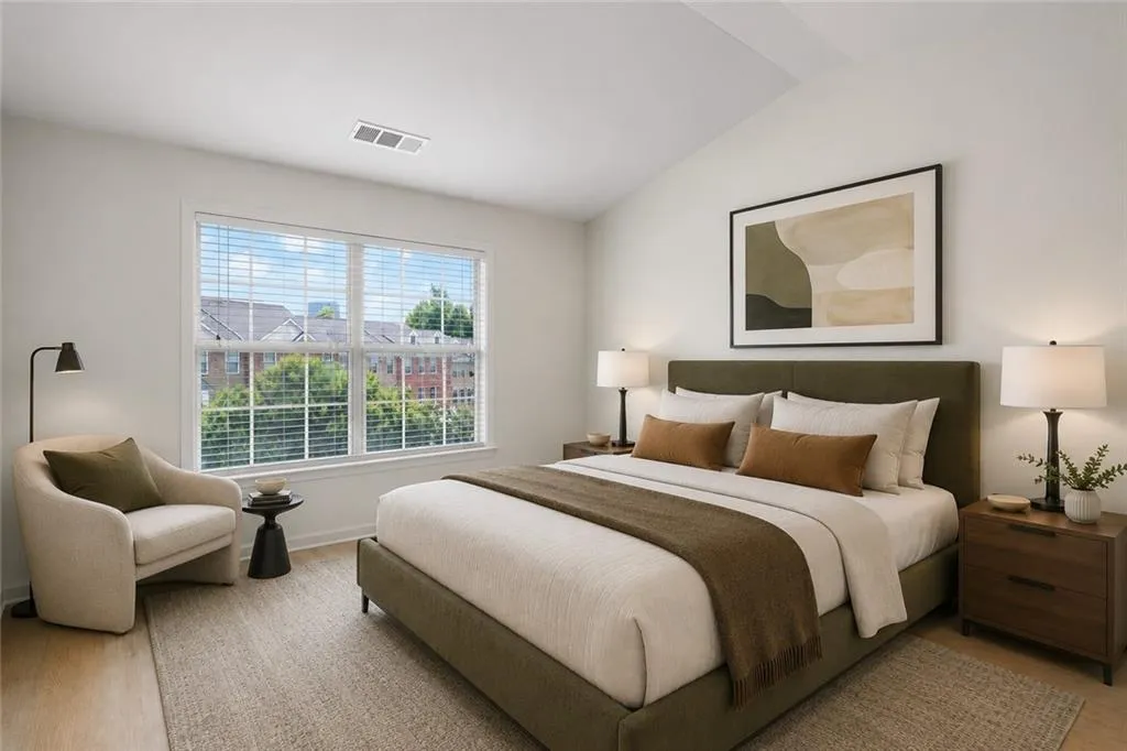 AI generated image of the first of two primary suites with furniture and design details added.