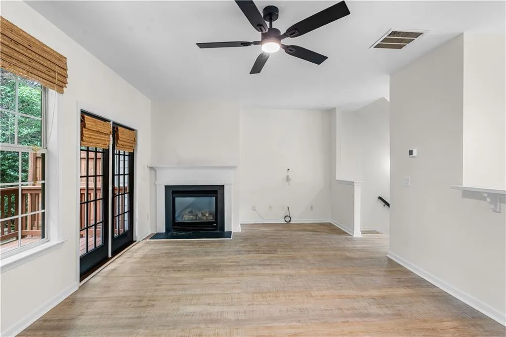 French doors lead to the large outdoor deck.