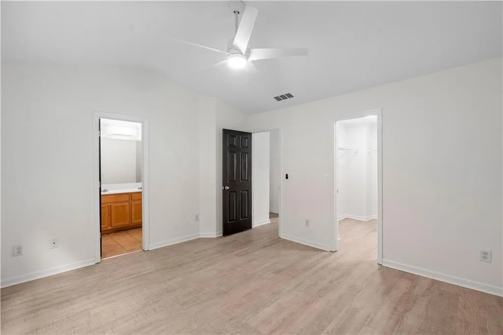 Vaulted ceiling and a contemporary fan for your cooling comfort.