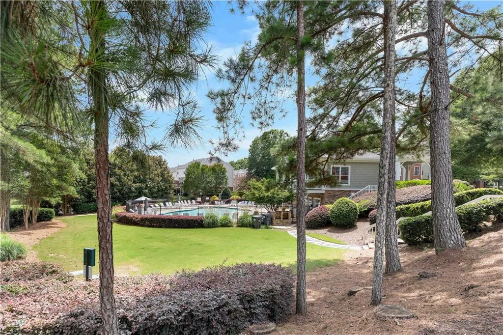A view of the greenspace surrounding the community pool.