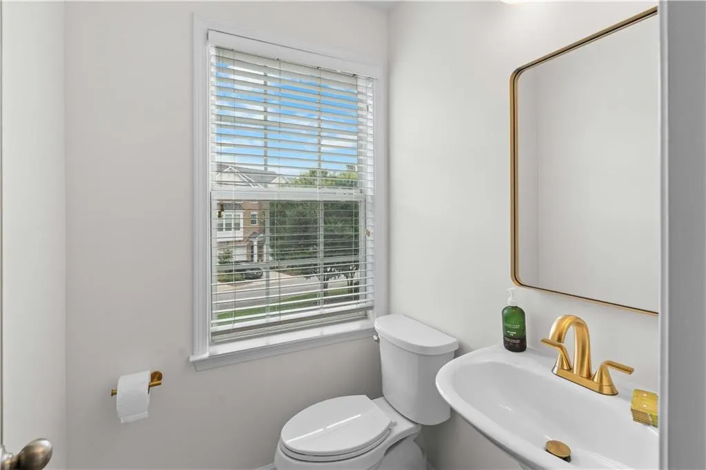The freshly updated powder room located on the main level of the home.