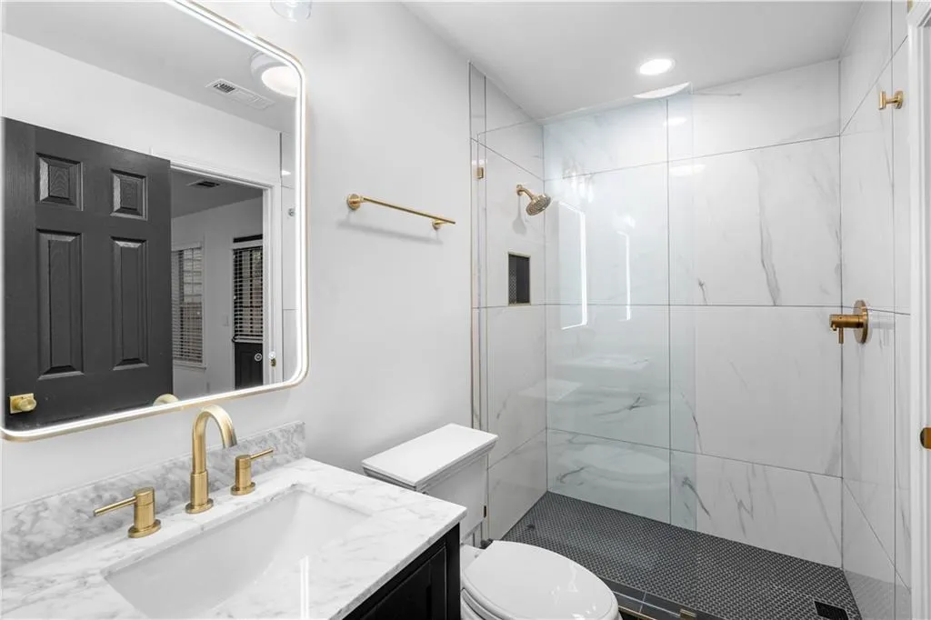 Featuring freshly updated finishes and a beautiful LED mirror.