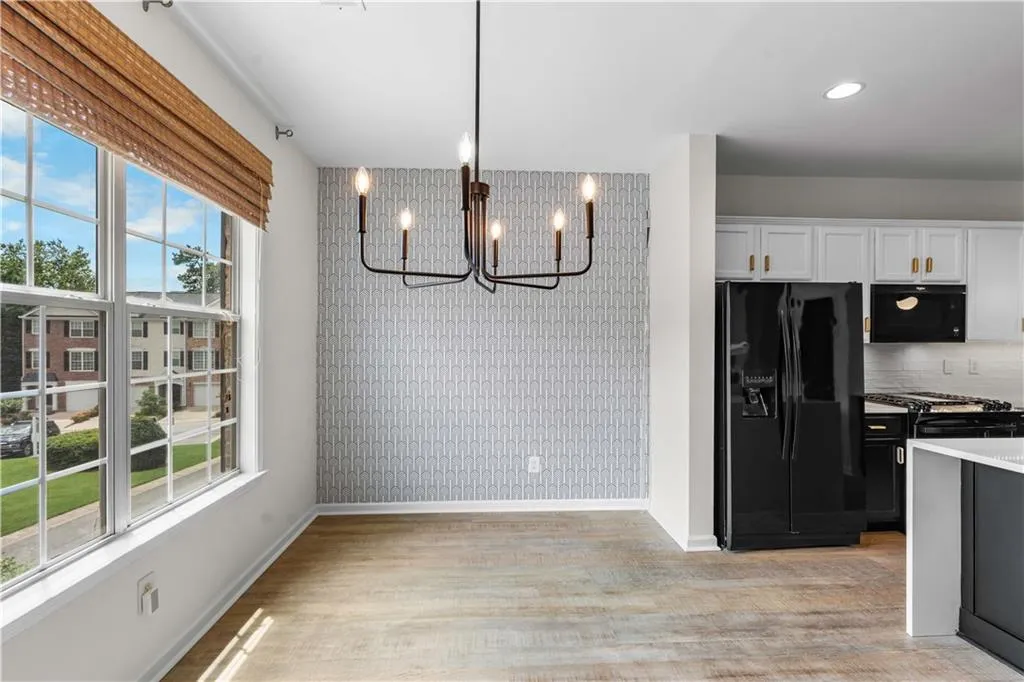 Updated lighting and a beautiful contemporary accent wall.