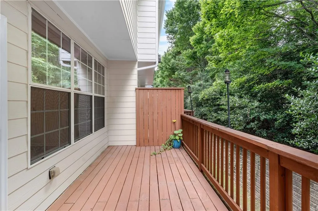 The expansive outdoor deck is located just off of the living room.
