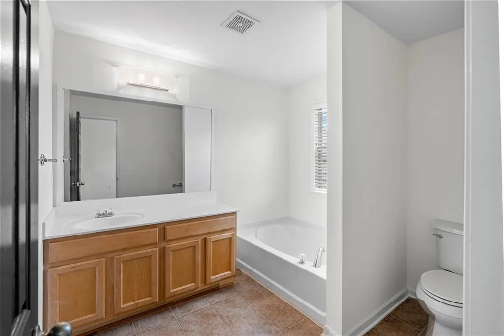 The first of two primary en suites.