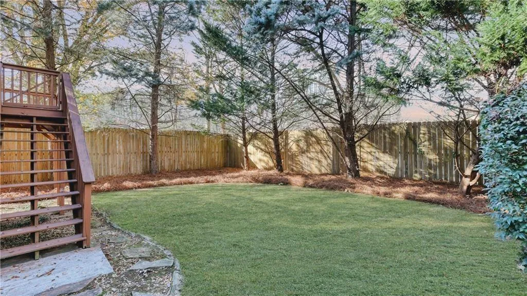 Fully fenced and private Backyard. Room for a playset, Soccor goals and more