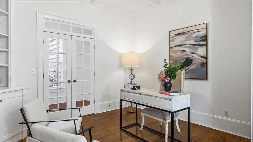 Separate office with French doors and custom built-in with tons of storage!