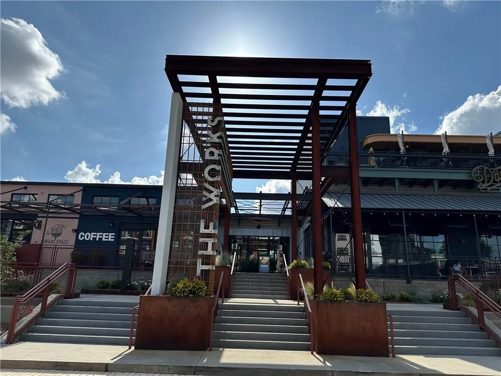 View of home's community featuring stairway