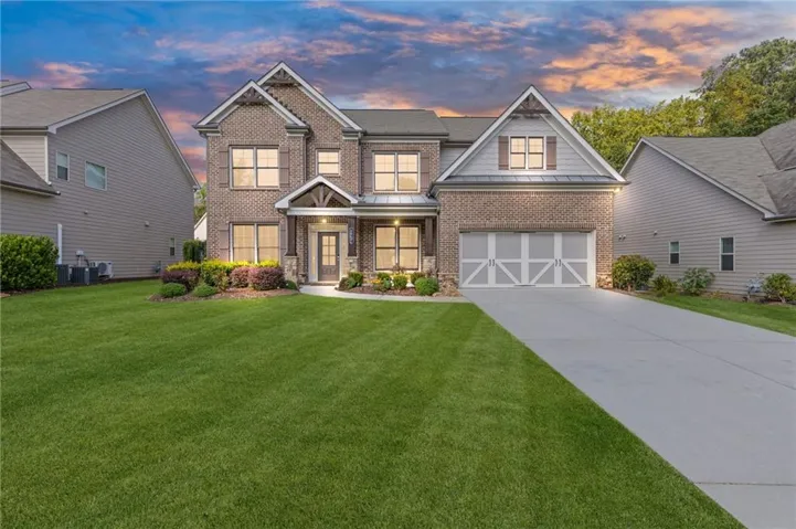 Brick and siding exterior with gabled roof lines