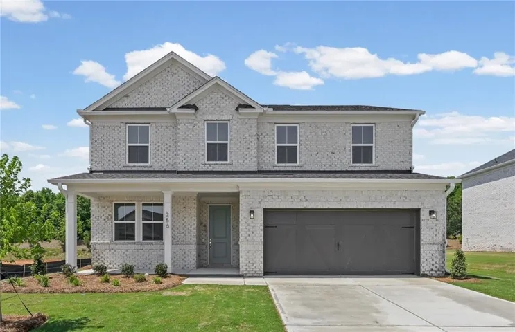 Two-story exterior featuring 4-Sides Brick