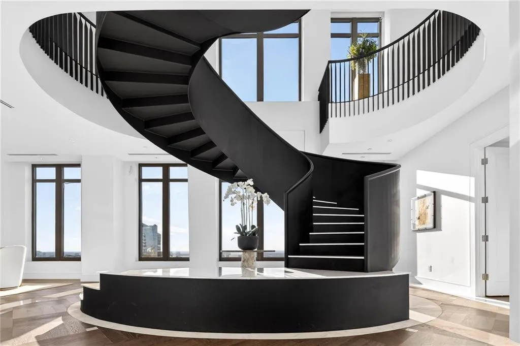 Stunning elliptical staircase joining the 2 floors