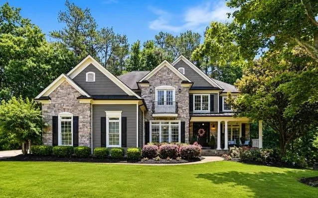 Elegant front elevation showing architecture, landscaping, and exceptional curb appeal.