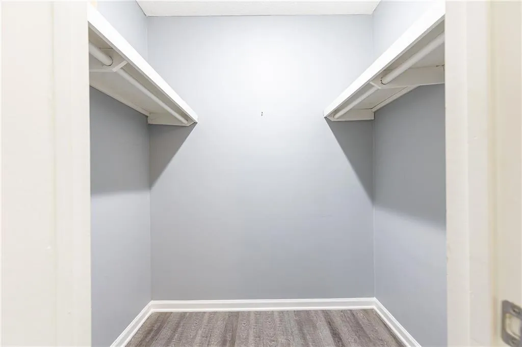 Walk-in closet in 1st Bedroom. Great storage!