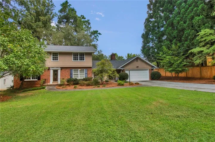 2594 West Fontainebleau Court is a 5 bedroom, 4 full bath traditional in Dunwoody