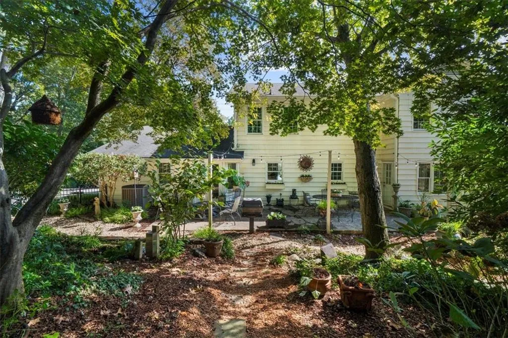 Rear view of house featuring a patio area