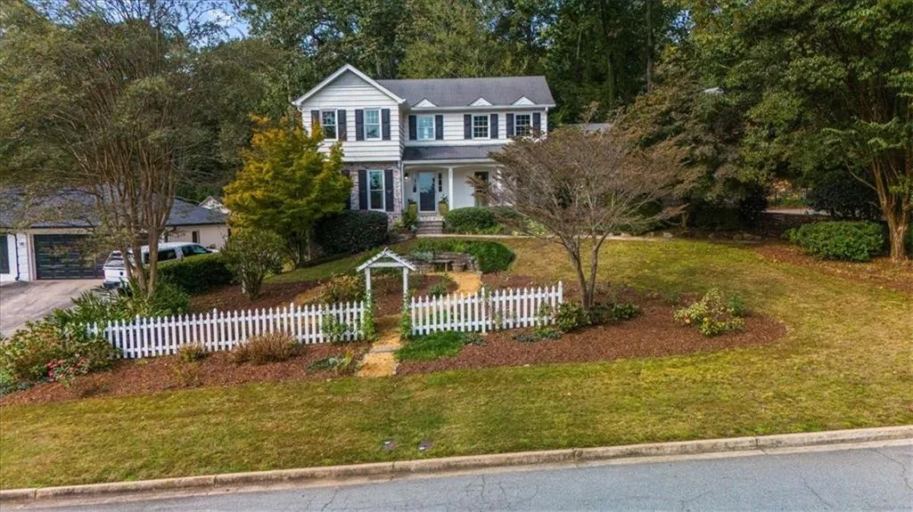 Traditional home with covered porch
