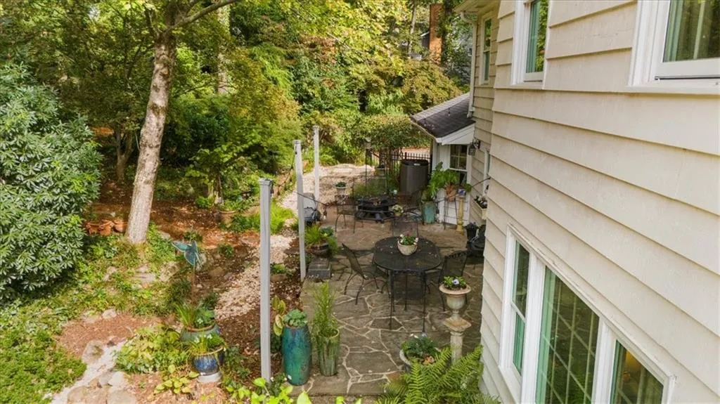 View of side of property with a patio