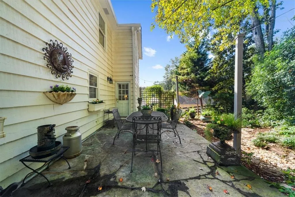 View of patio with outdoor dining area