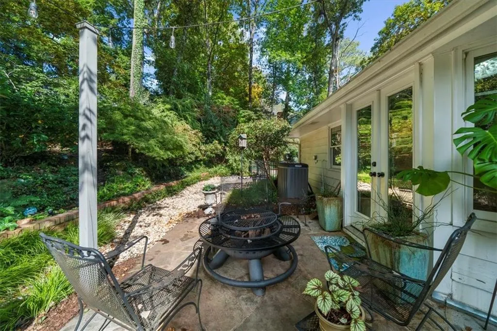 View of patio / terrace featuring a fire pit and french doors