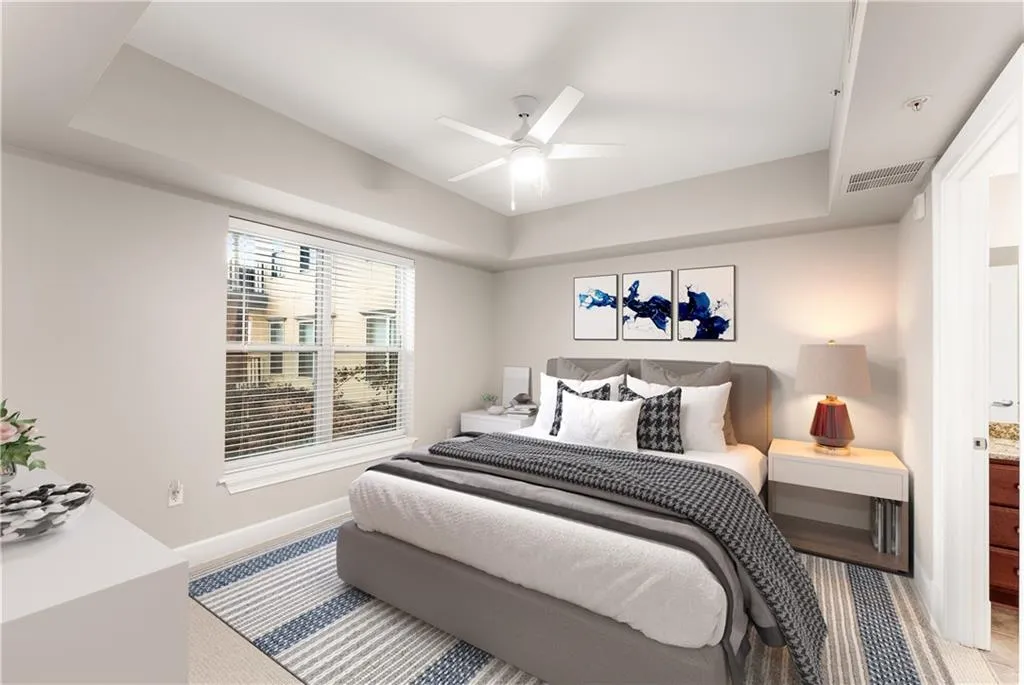 Plenty of room in this bright bedroom featuring NEW carpet.