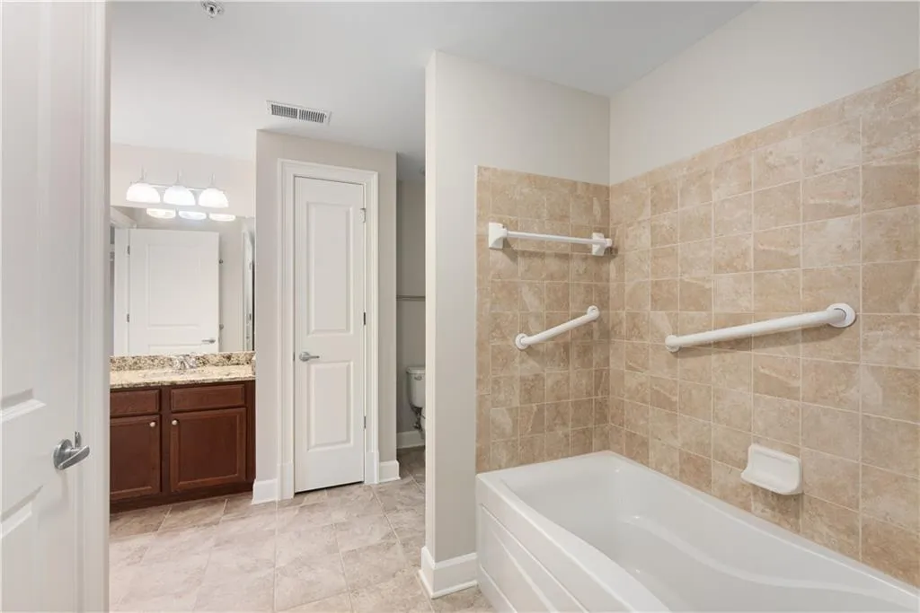 Bathroom with vanity and toilet