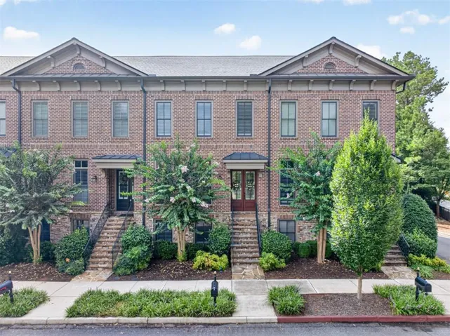 Three side brick exterior with stone accents