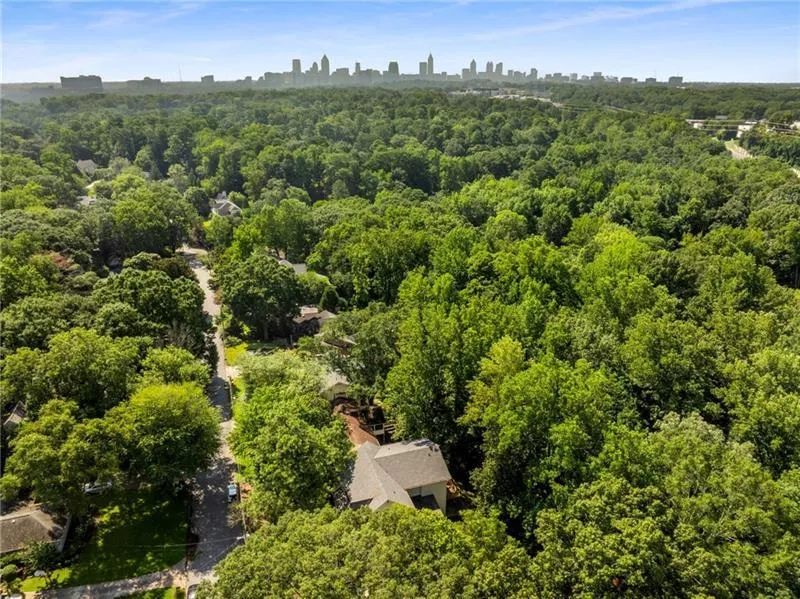 Drone / aerial view of a heavily wooded area