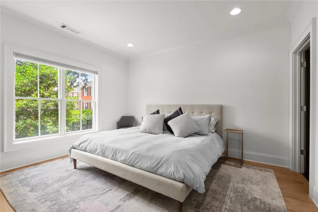Terrace level expansive bedroom with ensuite and exterior access with private porch.